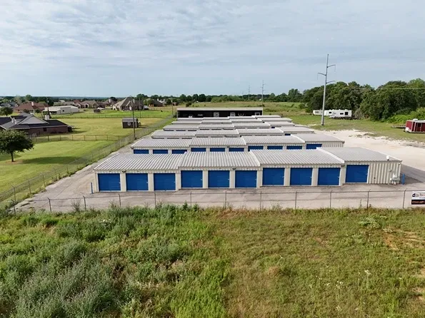Aerial view of drive up units and gate at Overflow Garage