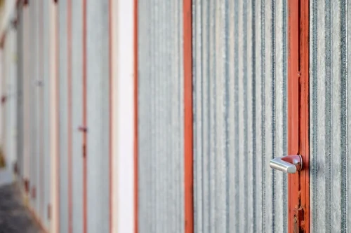 A row of self storage unit garage doors. 